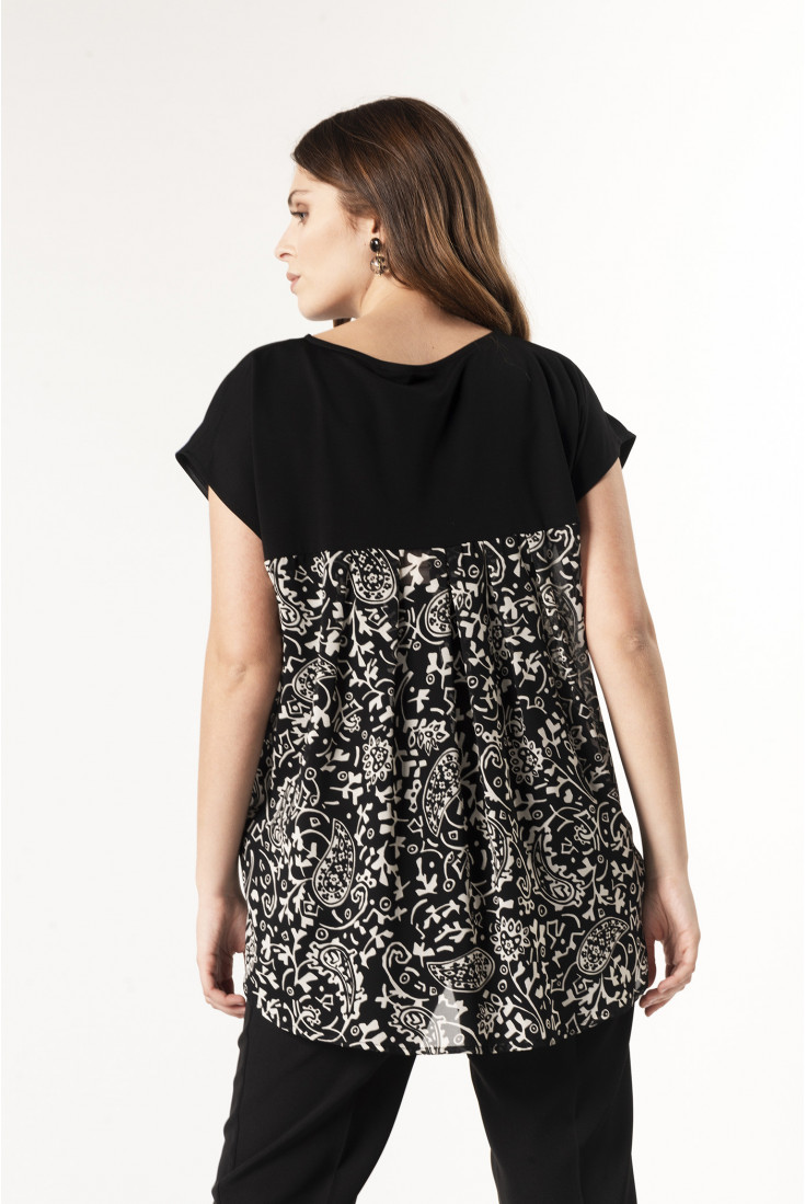 white shirt with yellow writing